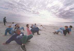 Fairforest Elementary students make like crabs on the beach during the Let's Sea part of the Enviromental Education Program at Barrier Island. GERRY PATE/STAFF
