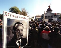 A crowd estimated at 46,000 people take part in a march and rally Monday in Columbia, S.C. The march was held in protest against the Confederate Flag flying above the South Carolina Statehouse.
