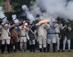 Re-enactors fight a battle at Walnut Grove Plantation during Festifall, Saturday, Oct. , 2010.