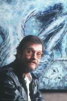 Local artist and Vietnam vet John weaver with one of his works.           1989.