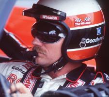 Dale Earnhart sits on pit row while his crew works on his #3 Chevy during 1991 Mello Yello 500 in Charlotte N.C. (Gerry Pate/ Spartanburg Herald Journal)