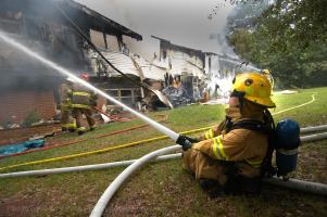 North Spartanburg and Inman firefighters work this fire on Jordan Creek Farm Road Monday afternoon. According to North Spartanburg fire chief Larry Brady no one was injured in the fire. (JANET NEWS)